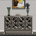 Ornate Console Cabinet With Carved Patterns And Decorative Vases Books Painting On Top