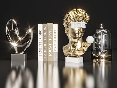 Decorative Ornament Set With Golden Bust Sculpture Transparent Decorative Piece And Books On Reflective Tabletop 3d model