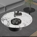 Round Marble Coffee Table With Black Tray Glasses Book In Modern Minimalist Living Room