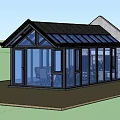 Brown Wooden Frame Glass House With Large Glass Windows Surrounded By Trees And Garden Seating Area