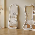 Two Stylish Decorative Mirrors With Unique Frame Design In Living Room