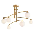 Elegant Golden Curved Chandelier with White Globe Shades and Modern Design