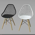 Stylish Modern Black and White Chairs Featuring Mesh Design and Wooden Legs
