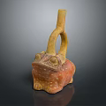 Traditional Frog Shaped Pottery With Curved Handle And Reddish Brown Spots
