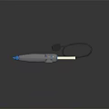 Gray Glue Gun With Blue Handle White Glue Stick And Black Power Cord