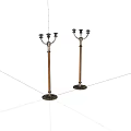 Pair Of Decorative Wooden Candle Holders With Metal Arms And Ornate Base