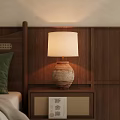 Warm Light Table Lamp With Terracotta Jar Base And White Lampshade On Bedroom Nightstand