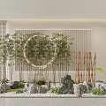 Bamboo Plants In Indoor Landscape With Circular Ring Decorative Rocks And Lattice Wall
