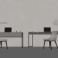 Modern Workspace With Two Gray Desks Laptops Chairs And Potted Plant