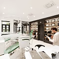 Modern Dental Clinic Interior With Dental Chair Medical Equipment And Certificates On Shelves