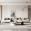 Modern Minimalist Living Room With Light Gray Sofa Round Coffee Table Floor Lamp Decorative Artwork