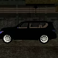 Black SUV With Silver Wheels And Tinted Windows In Industrial Setting