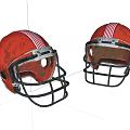 Two Orange Football Helmets With Red White Stripes And Black Facemasks
