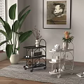 Black and Silver Rolling Storage Carts With Decorative Items In Indoor Living Space
