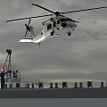 Helicopter Taking Off From Ship Deck With Ground Crew And Overcast Sky