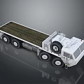 Heavy Duty Flatbed Truck With Multiple Wheels And White Cab For Cargo Transport