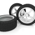 Two Modern Car Tires With Silver Alloy Wheels And Tread Pattern Design