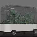 Modern Transparent Mobile Plant Container Structure With Lush Green Plants And Wheels