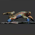 Colorful Painted Lizard Sculpture With Vibrant Patterns On Rock Base