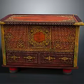 Vintage Ornate Chest With Red Yellow Brown Colors Hexagonal Center Design And Red Footed Base