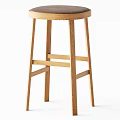 Wooden Bar Stools With Round Leather Seats And Crossed Stretchers In Light Dark Tones