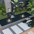 Garden Decor With Water Feature Lush Green Plants Stone Slabs And Soft Lighting Setup