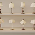 Assorted Table Lamps With Wooden Bases And Fabric Shades On Shelf Display For Home Decor