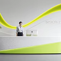 Professional Reception Desk With Friendly Receptionist Computer Green Plant And Curved Yellow Wall Design Elements
