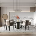 Modern Restaurant Interior With Round Dining Table Beige Chairs Hanging Pendant Lights And Landscape Wall Art
