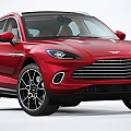 Aston Martin Red SUV Exterior Featuring Brown Leather Interior And Steering Wheel