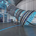 Modern Tech Exhibition Hall Interior With Spiral Glass Structure And Blue Lighting
