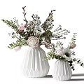 White Geometric Ceramic Vases Floral Arrangement With Pink Roses Green Eucalyptus And White Blooms