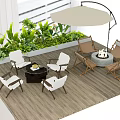 Outdoor Table And Chair Set With Wooden Deck Fire Pit Umbrella And Green Plants