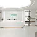Modern Bright White Office Reception Desk With Comfortable Waiting Area And Neat Functional Coffee Corner