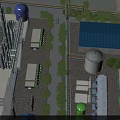 Industrial Manufacturing Plant With Blue Water Tower Storage Tanks Pipes And Green Trees