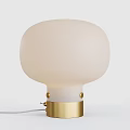 Modern White Spherical Lampshade Table Lamp With Gold Base And Decorative Accents