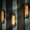 Modern Wall Lamps Mounted On Dark Wood Grain Wall With Transparent Shades And Filament Bulbs