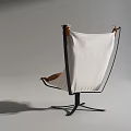 Modern Brown Leather Armchair With Metal Frame And Geometric Decorations Near Side Table
