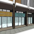 Multi Story Residential Building With Ground Floor Storefronts And Traditional Roof Design