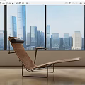 Modern Lounge Chair With Wicker Design And Metal Frame By Window Overlooking City Skyline