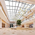 Spacious Bright Modern Shopping Mall Hall With Glass Skylight Escalators And Elegant Hanging Art Decorations