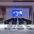 Modern Meeting Room Interior With Large Screen Earth Display Black Chairs And Wooden Walls