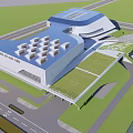 Modern Geometric Architecture Complex With Blue Roofs Sports Field And Surrounding Green Areas