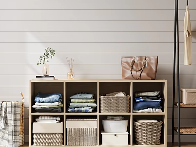 Organized Walk in Closet Interior With Wicker Baskets Folded Clothes And Handbag 3d model