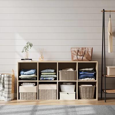 Organized Walk in Closet Interior With Wicker Baskets Folded Clothes And Handbag 3d model