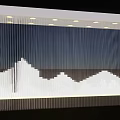Modern Sleek Chandelier With Vertical Lines And White Mountain Pattern Illuminated In Dark Background