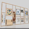 Elegant Display Space With Golden Frame Racks Colorful Scarves Decorative Paintings And Black Vases
