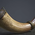 Handcrafted Wooden Horn Musical Instrument With Intricate Carved Patterns And Red White Beaded Strings