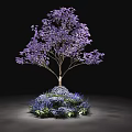 Decorative Tree Pit With Purple Flowering Tree And Blue Surrounding Flowers Illuminated