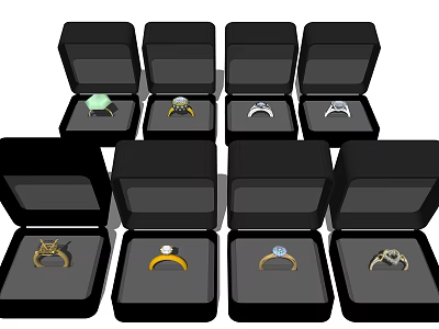 Elegant Jewelry Rings In Open Black Boxes Featuring Various Gemstone And Metal Designs 3d model